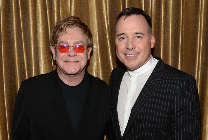 Elton John and David Furnish in April 2013. (Getty Images)
