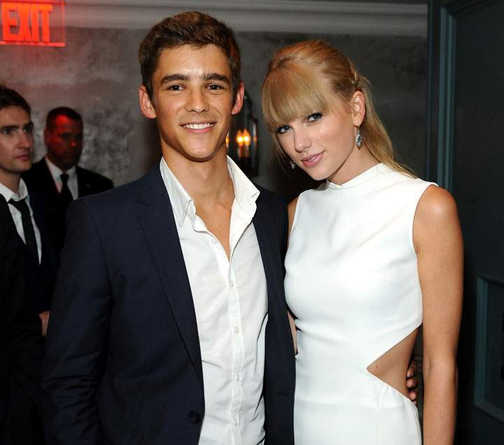 At a TIFF party, Taylor Swift posed with actor Brenton Thwaites. Minutes later she wrote and recorded a song about their relationship called “I am Never (Ever) Posing With You Again.” (Getty Images)
