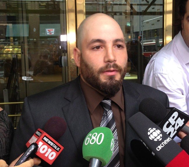 Adam Nobody talks to media outside court in Toronto, Thursday, Sept.12, 2013.