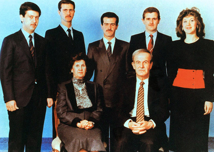 Undated picture shows Syrian President Hafez al-Assad and his wife Anisseh posing for a family picture with his children (L to R) Maher, Bashar, Bassel, who died in a car accident in 1994, Majd and Bushra. ( LOUAI BESHARA/AFP/Getty Images).