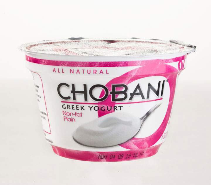 Chobani is pulling some of its Greek yogurt from supermarket shelves after hearing of "swelling or bloating" in cups.