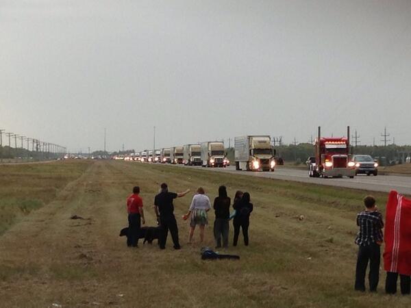 Families, friend and spectators gathered by the Perimeter to show their support for Manitoba's World's Largest Trucking Convoy for Special Olympics.