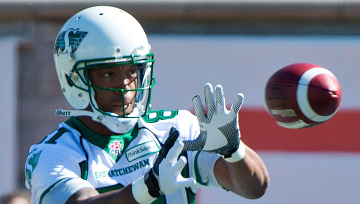 Saskatchewan Roughriders' Geroy Simon makes a catch during the warm-up prior to a CFL football game against the Montreal Alouettes in Montreal, Sunday, September 29, 2013. Simon caught a pass in the first quarter to break the CFL’s all-time receptions record.