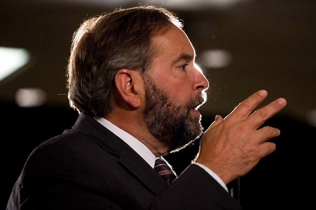 NDP leader Tom Mulcair speaks in Surrey, B.C., on August 29, 2013. The NDP leader is coming out swinging at Justin Trudeau, whose existence he's barely acknowledged until now. 