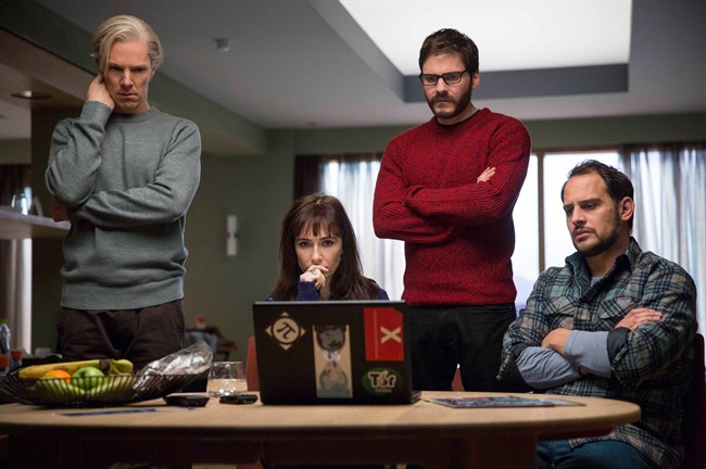 Benedict Cumberbatch (as Julian Assange), left, in a scene from 'The Fifth Estate.'.