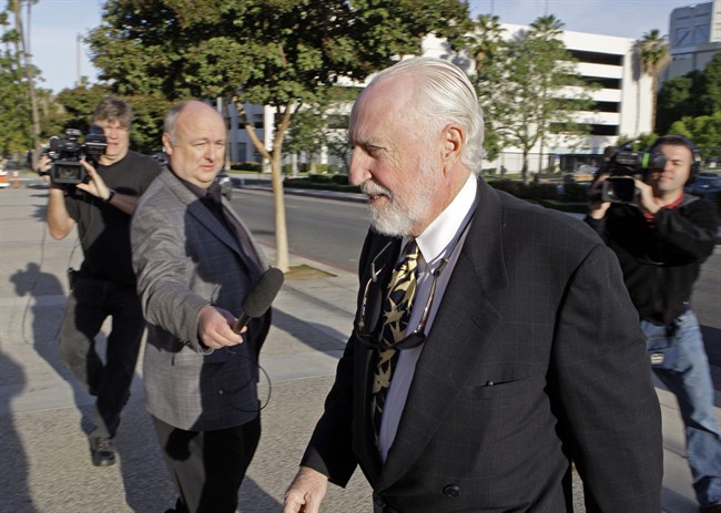 Peter Pocklington, of Canada, the former owner of the Edmonton Oilers NHL hockey team, arrives at U.S. District Court for sentencing on perjury charges, in Riverside, Calif., on Oct. 27, 2010. 
