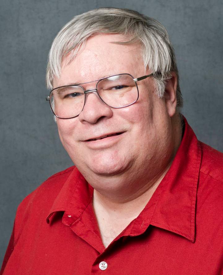 This photo provided by the University of Kansas shows professor David Guth , who has been placed on leave because of a tweet he published after this week's mass shooting in Washington, the university said Friday, Sept. 20, 2013.