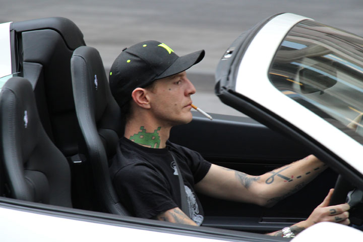 Deadmau5 smokes behind the wheel of his Ferrari on Bloor Street on Sept. 10. (Photo: John R. Kennedy / Global News)