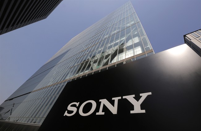 In this May 22, 2013 photo, Sony's logo is seen outside the company's headquarters in Tokyo. 