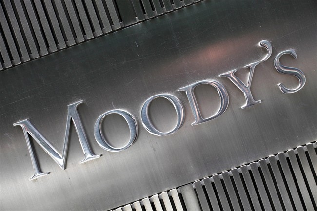 This Aug. 13, 2010 photo shows a sign for Moody's Corp. in New York. 