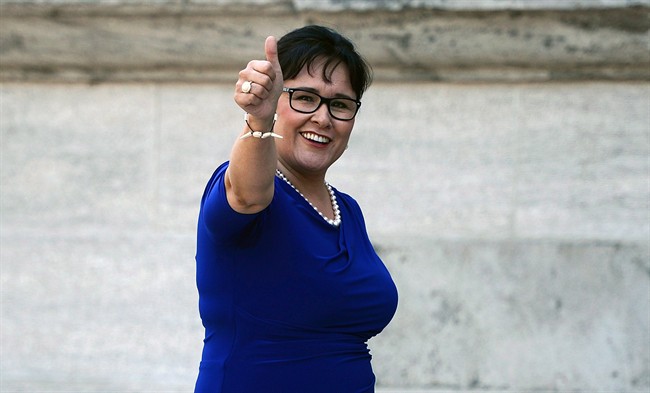 Leona Aglukkaq is pictured in Ottawa, July 15, 2013.  On Tuesday, the Ministry of Environment gave the thumbs-up for an iron ore mine in western Labrador.