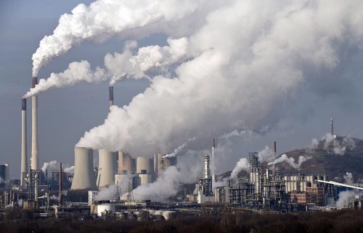 In this Dec. 16, 2009 file photo, steam and smoke rises from a coal power station in Gelsenkirchen, Germany. Scientists are more confident than ever that pumping carbon dioxide into the air by burning fossil fuels is warming the planet. 