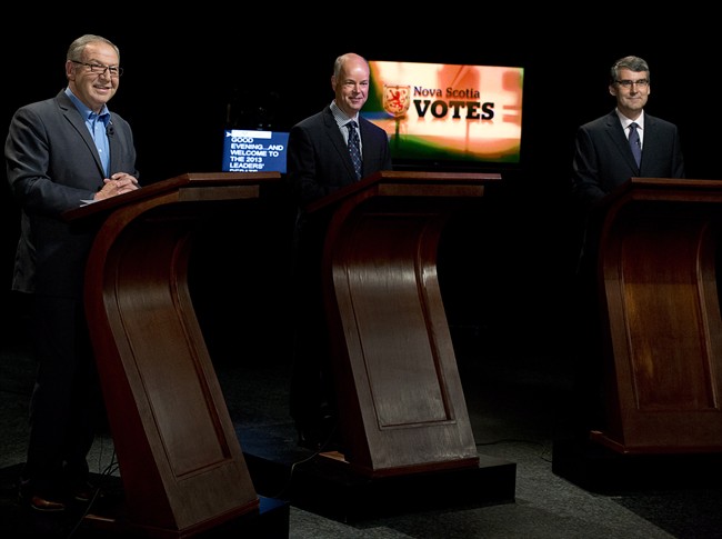 NDP leader Darrell Dexter, Progressive Conservative leader Jamie Baillie and Liberal leader Stephen McNeil, left to right, wait for the start of a televised leaders' debate in Halifax on Sept. 25, 2013. 