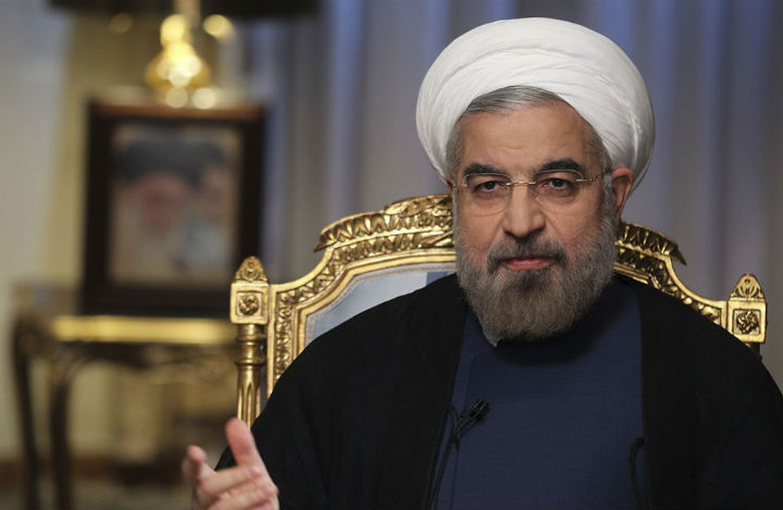 In this Sept. 10, 2013 photo released by the official website of the office of the Iranian Presidency, Iranian President Hasan Rouhani speaks during an interview with state television at the presidency in Tehran, Iran.