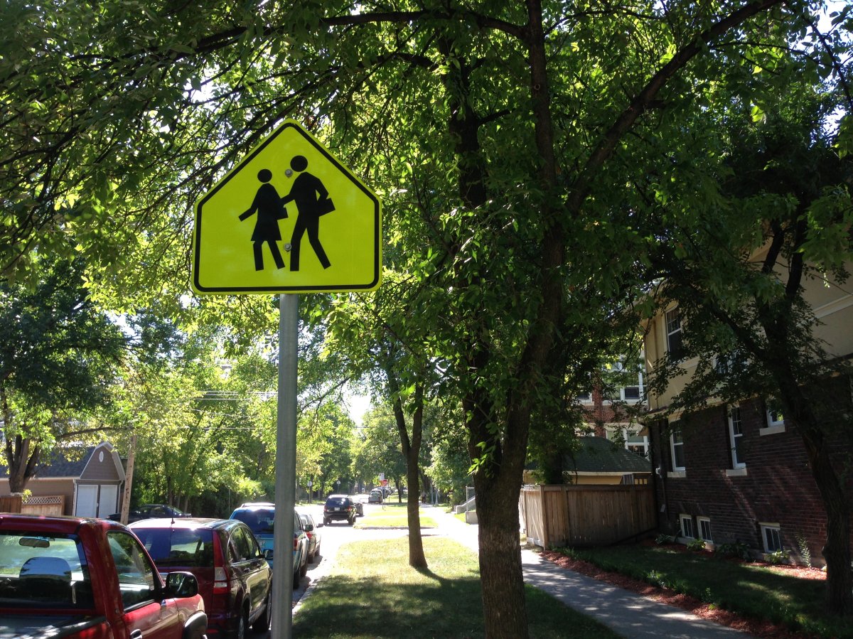 FILE: A photo of a playground zone sign in a residential neighborhood.