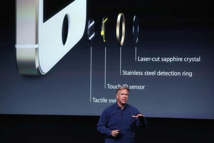 Apple Senior Vice President of Worldwide Marketing Phil Schiller speaks about Touch ID during an Apple product announcement at the Apple campus.