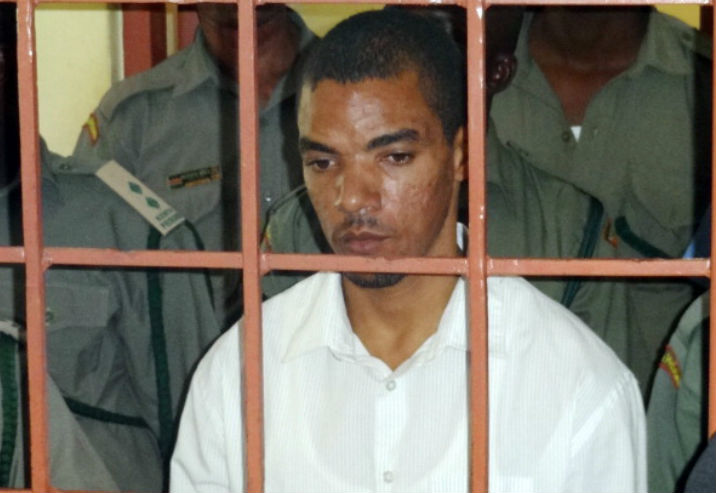 Suspected British militant Jermaine Grant, accused of ties to Somalia’s Al-Qaeda-linked Shebab and plotting attacks, arrives on September 24, 2013 for the start of his trial before Shanzu law court in the port city of Mombasa. Grant was arrested in December 2011 in Mombasa with various chemicals, batteries and switches, which prosecutors say he planned to use to make explosives. Prosecutors have accused Grant, a 30-year-old Muslim convert, of working with fellow Briton Samantha Lewthwaite. (Photo: AFP/Getty Images)