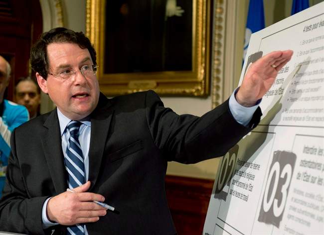 Quebec Minister responsible for Democratic Institutions and Active Citizenship Bernard Drainville presents the Charter of Quebec values Tuesday, September 10, 2013 at the legislature in Quebec City. THE CANADIAN PRESS/Jacques Boissinot.