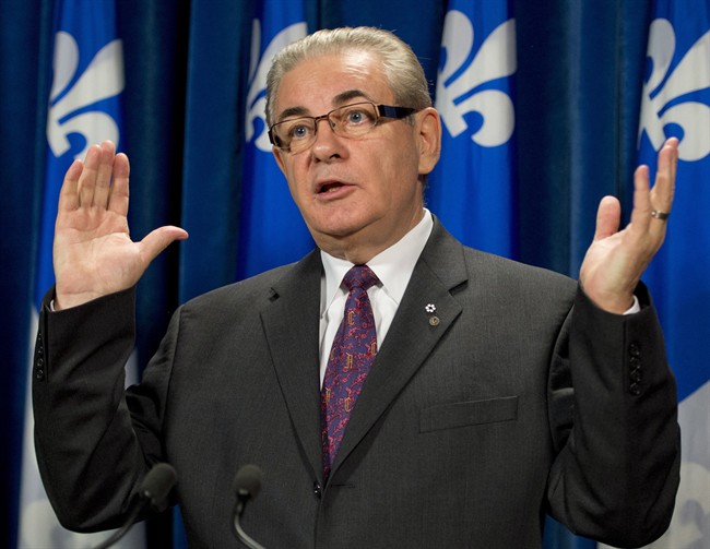 Coalition Avenir Quebec legislature member Jacques Duchesneau comments on former Parti Quebecois minister Andre Boisclair, Wednesday, September 25, 2013 at the legislature in Quebec City.