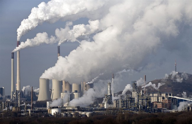  In this Dec. 16, 2009 file photo, steam and smoke rises from a coal power station in Gelsenkirchen, Germany. Scientists are more confident than ever that pumping carbon dioxide into the air by burning fossil fuels is warming the planet. 