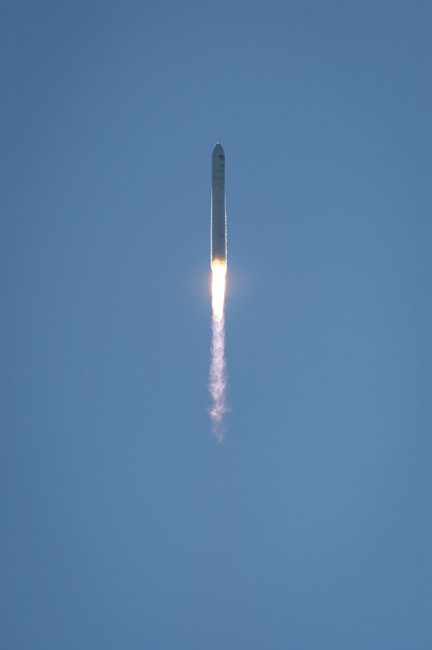 the Orbital Sciences Corp. cargo ship Cygnus launches from NASA's Wallops Flight Facility on Wednesday, Sept. 18, 2013, in Wallops Island, Va.