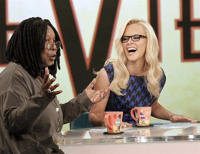 This image released by ABC shows co-hosts Whoopi Goldberg, left, and Jenny McCarthy during a broadcast of "The View," Monday, Sept. 9, 2013 in New York. (AP Photo/ABC, Lou Rocco).