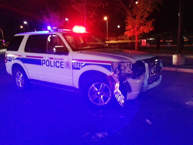 The truck sped away as police approached it, hitting their cruiser in the process. 