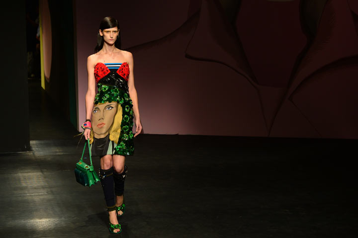 A model presents a creation for fashion house Prada as part of the spring/summer 2014 ready-to-wear collections during the fashion week in Milan on September 19, 2013.