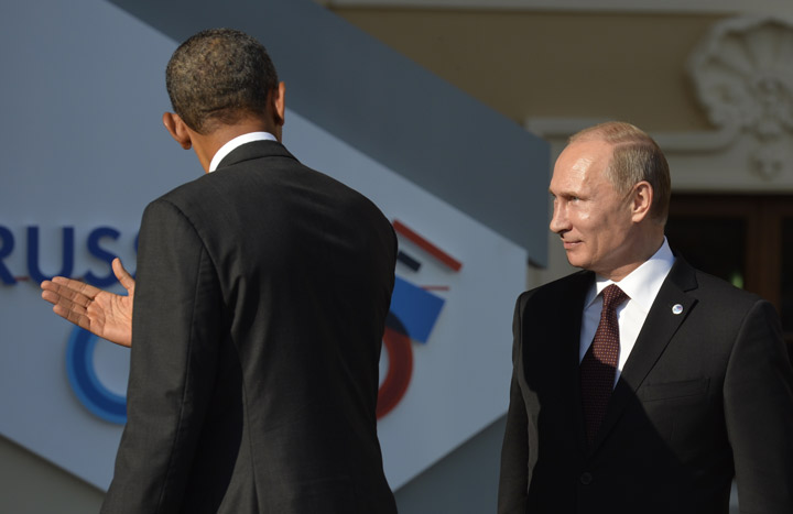 Obama is welcomed by Putin Sept. 5, 2013 at the G20 Summit in Russia. ERIC FEFERBERG/AFP/Getty Images