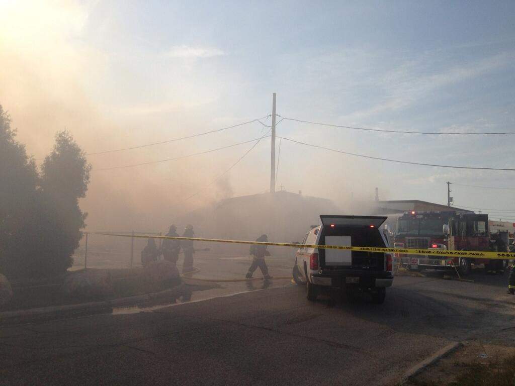 Firefighters battled smoke and fire on Sanford Street on Friday morning.