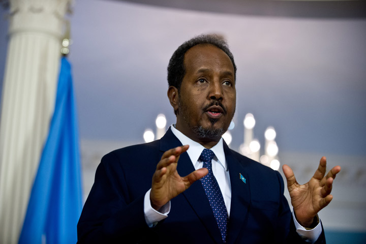 Somali President Hassan Sheikh Mohamud speaks to the press with US Secretary of State John Kerry prior to talks at the State Department in Washington,DC on September 20, 2013.