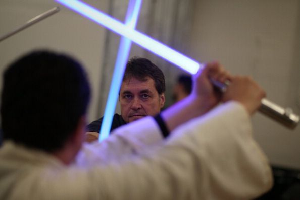 Star Wars fans train as Jedis in lightsaber class in San Francisco (Photo by Justin Sullivan/Getty Images).