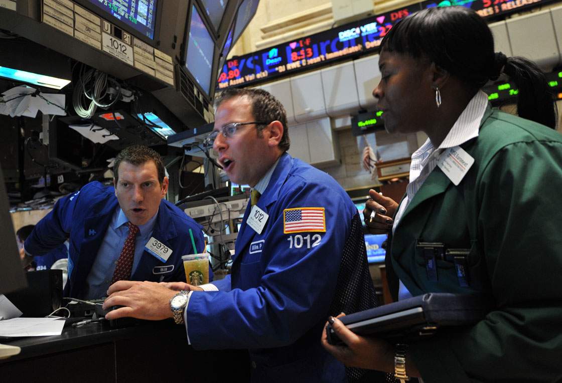 Markets are bracing for the end of stimulus spending by the U.S. Federal Reserve. The measures have helped fuel a bull run on stock markets in recent years. 