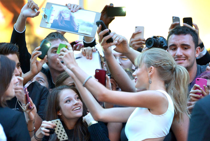 Taylor Swift greets fans outside the Elgin Theatre in Toronto.