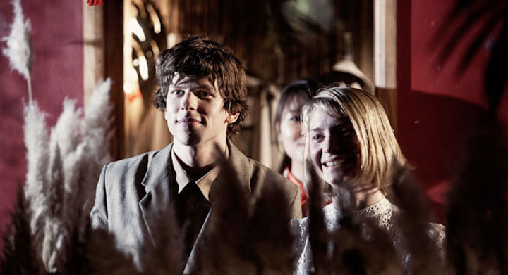 Jesse Eisenberg and Mia Wasikowska in a scene from 'The Double.'.