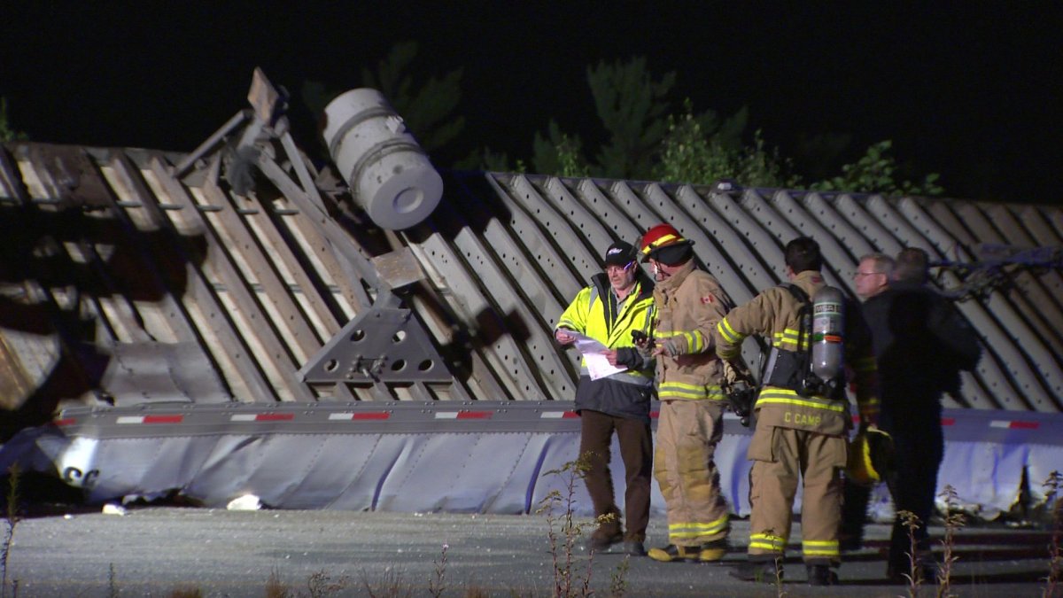 UPDATED: Crews clean up after truck flips and spills toxic materials in Dartmouth - image