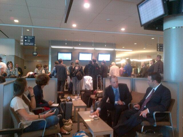 Stranded passengers wait in Porter Airlines' Billy Bishop Airport in Toronto, ON. on Sept. 17, 2013.