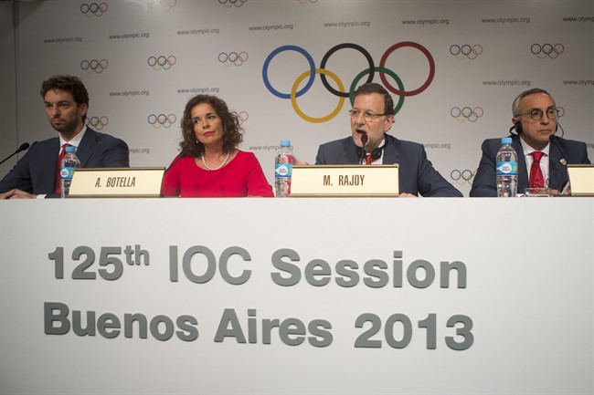 Spain's Olympic bid Committee President Alejandro Blanco, right, Spain's Prime Minister Mariano Rajoy, second from right, Madrid's Mayor Ana Botella, third from right, and NBA player Pau Gasol give a news conference after making their bid presentation in Buenos Aires, Argentina, Saturday, Sept. 7, 2013.