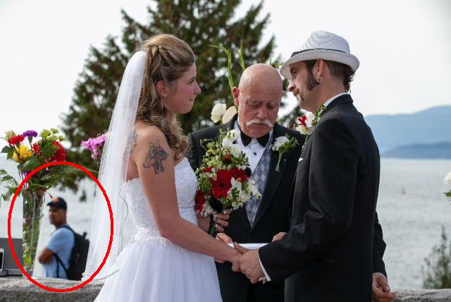 Suspected thief pictured in the background of a wedding shot. 