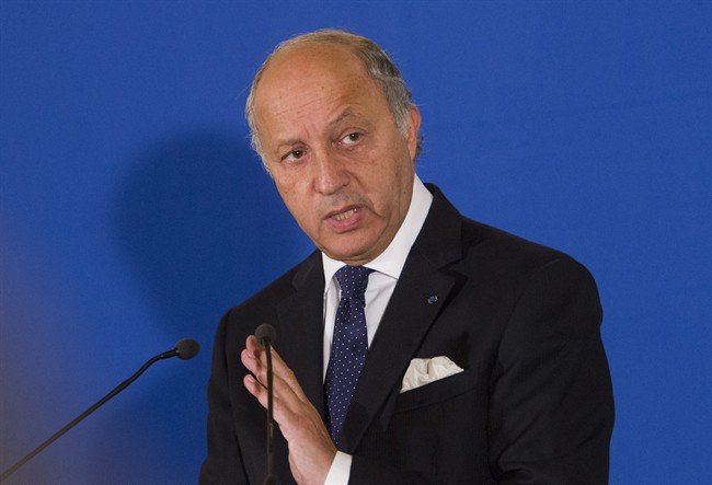 France's Foreign Minister Laurent Fabius speaks during a press meeting