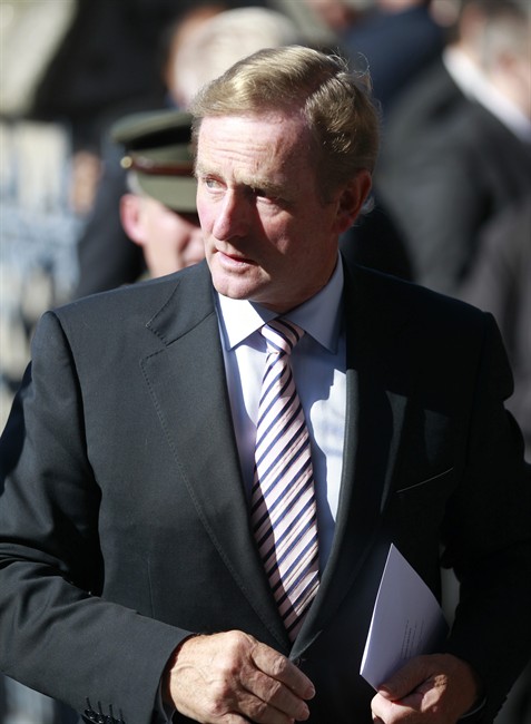 Irish Prime Minister Enda Kenny attends the funeral of Irish poet Seamus Heaney during a funeral mass at the Church of the Sacred Heart in Donnybrook, Dublin, Ireland, Monday, Sept. 2, 2013. 