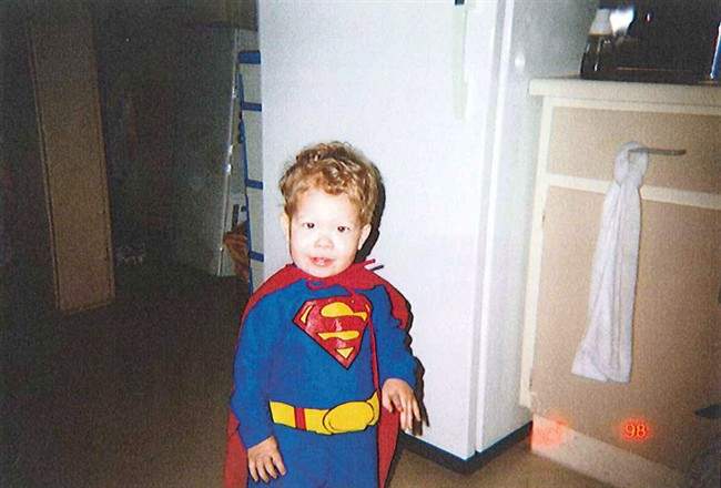 Jeffrey Baldwin is shown in a Halloween costume in this undated handout photo released at the inquest into his death. 