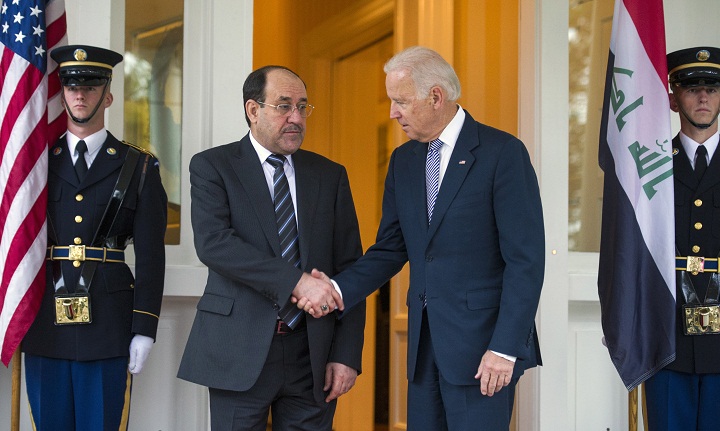 Vice President Joe Biden welcomes Iraqi Prime Minister Nouri al-Maliki to the vice president's residence, the Naval Observatory, for a breakfast meeting, Wednesday, Oct. 30, 2013, in Washington. President Barack Obama plans to host the prime minister at the White House on Nov. 1.