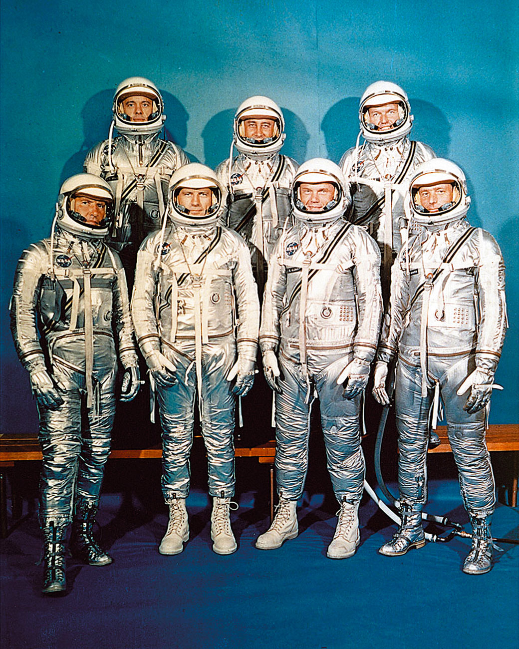 US Mercury program astronauts in their space suits pose for a family picture in 1962. First row from left to right: ‘Wally’ Schirra, Donald K. ‘Deke’ Slayton, John Glenn, Scott Carpenter; second row from left to right: Alan Shepard, Virgil Grissom, Gordon Cooper. (NASA)