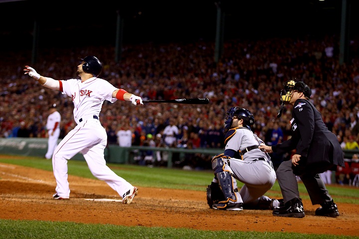 BOSTON, MA - OCTOBER 19: Shane Victorino #18 of the Boston Red Sox hits a grand slam home run against Jose Veras #31 of the Detroit Tigers in the seventh inning during Game Six of the American League Championship Series at Fenway Park on October 19, 2013 in Boston, Massachusetts.