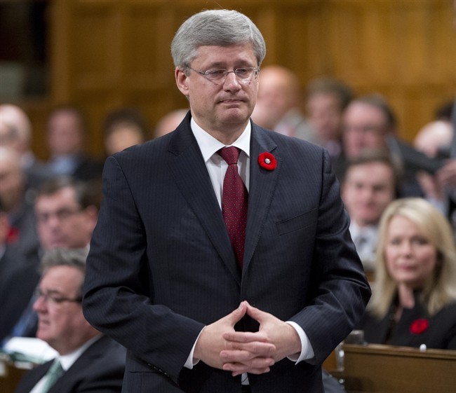 Canadian Prime Minister Stephen Harper responds to a question during Question Period in the House of Commons Tuesday October 29, 2013 in Ottawa. 