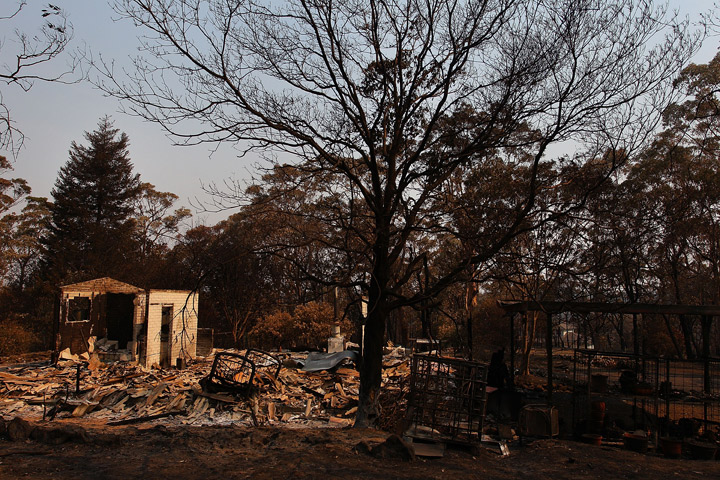 A home destroyed by bushfire as seen on October 21, 2013 in Yellow Rock, Australia. One man has died and hundreds of properties have been destroyed in bushfires that are devastating the Blue Mountains and Central Coast regions of New South Wales. (Photo credit: Getty Images)