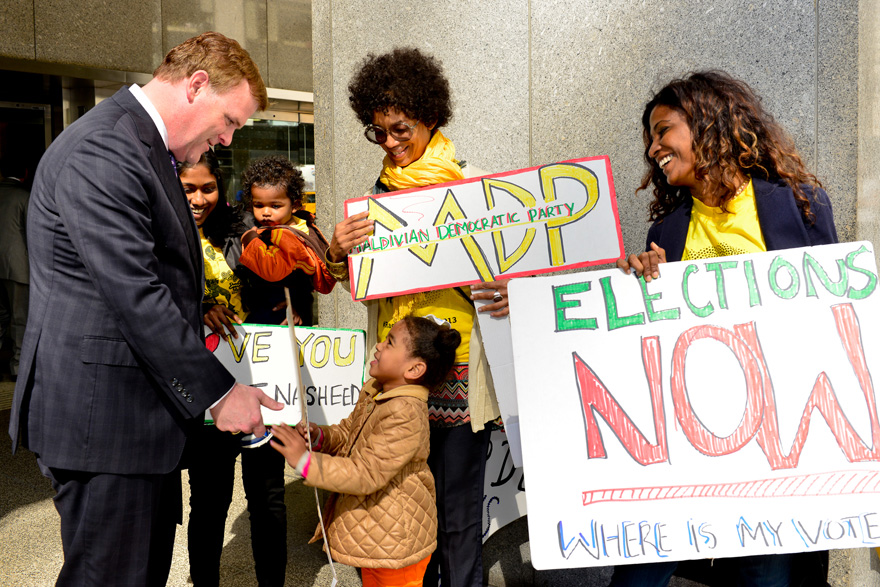 Foreign Affairs Minister John Baird meets with protesters from the Maldives in New York. Handout photo.