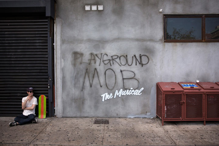 Street art reading, 'Playground Mob, The Musical,' allegedly done by the British street artist Banksy, is seen in the Lower East Side on October 4, 2013 in New York City.