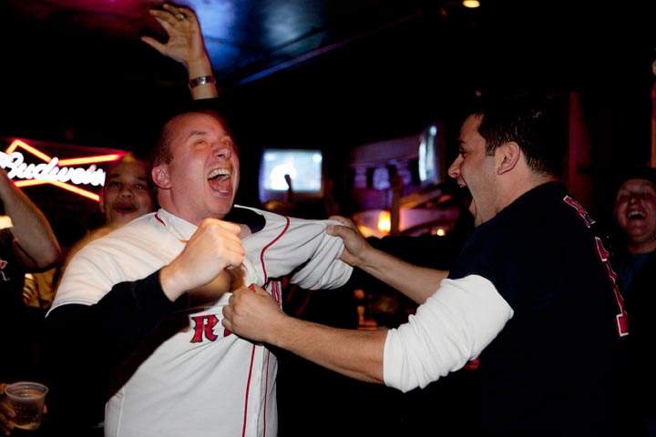 Fans of the Boston Red Sox react to a play at Copperfield’s Bar during Game 6 of the World Series. (Kayana Szymczak/Getty Images)